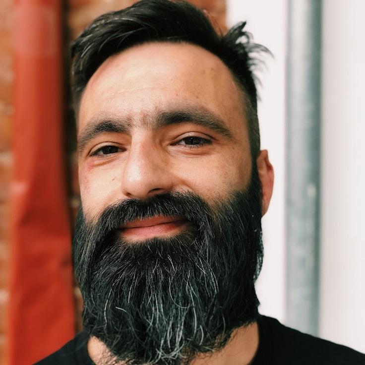 Portrait of Alex Marin, community mentor and Italian cuisine specialist